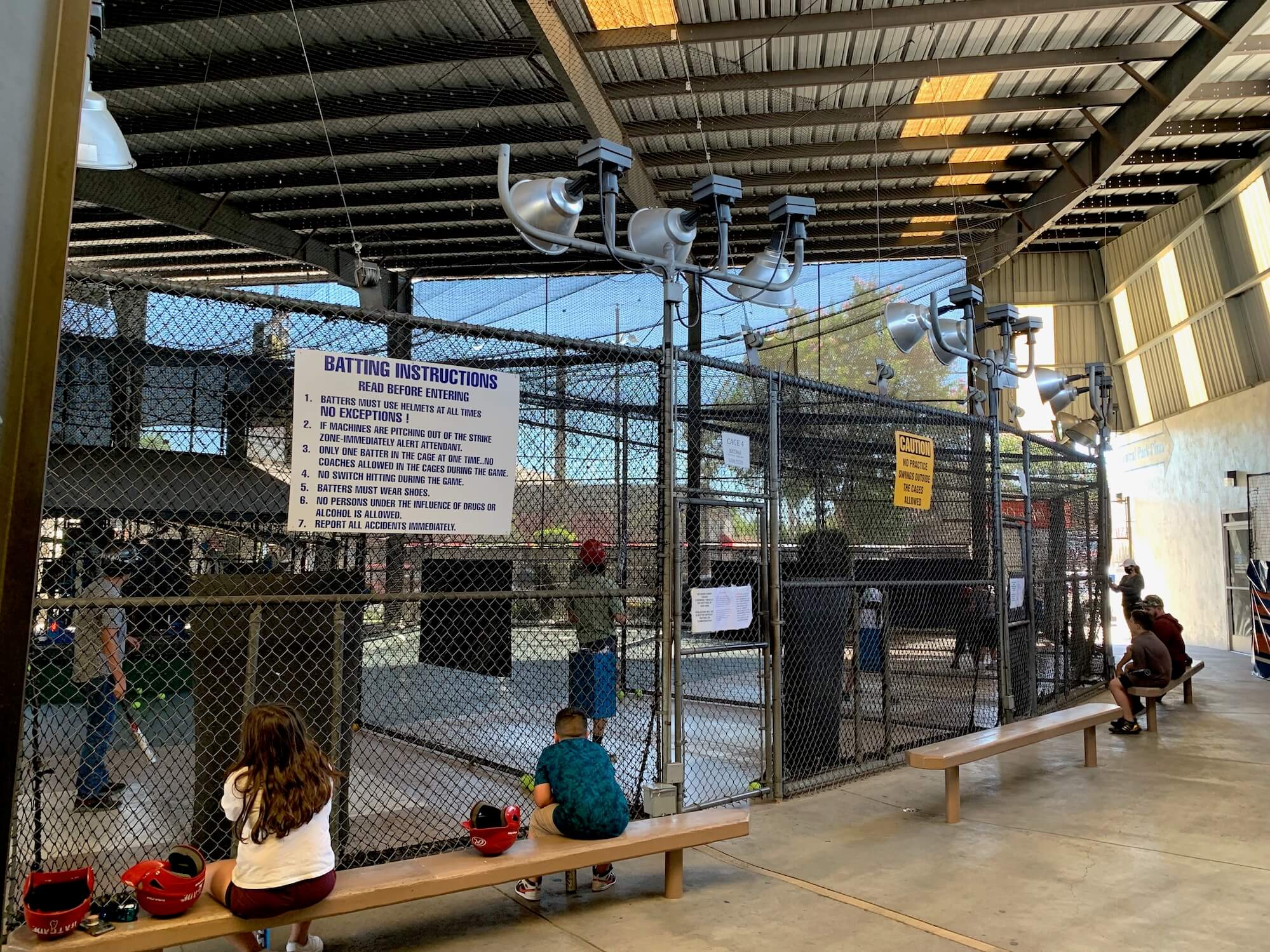 Batting cages in use at BatCade
