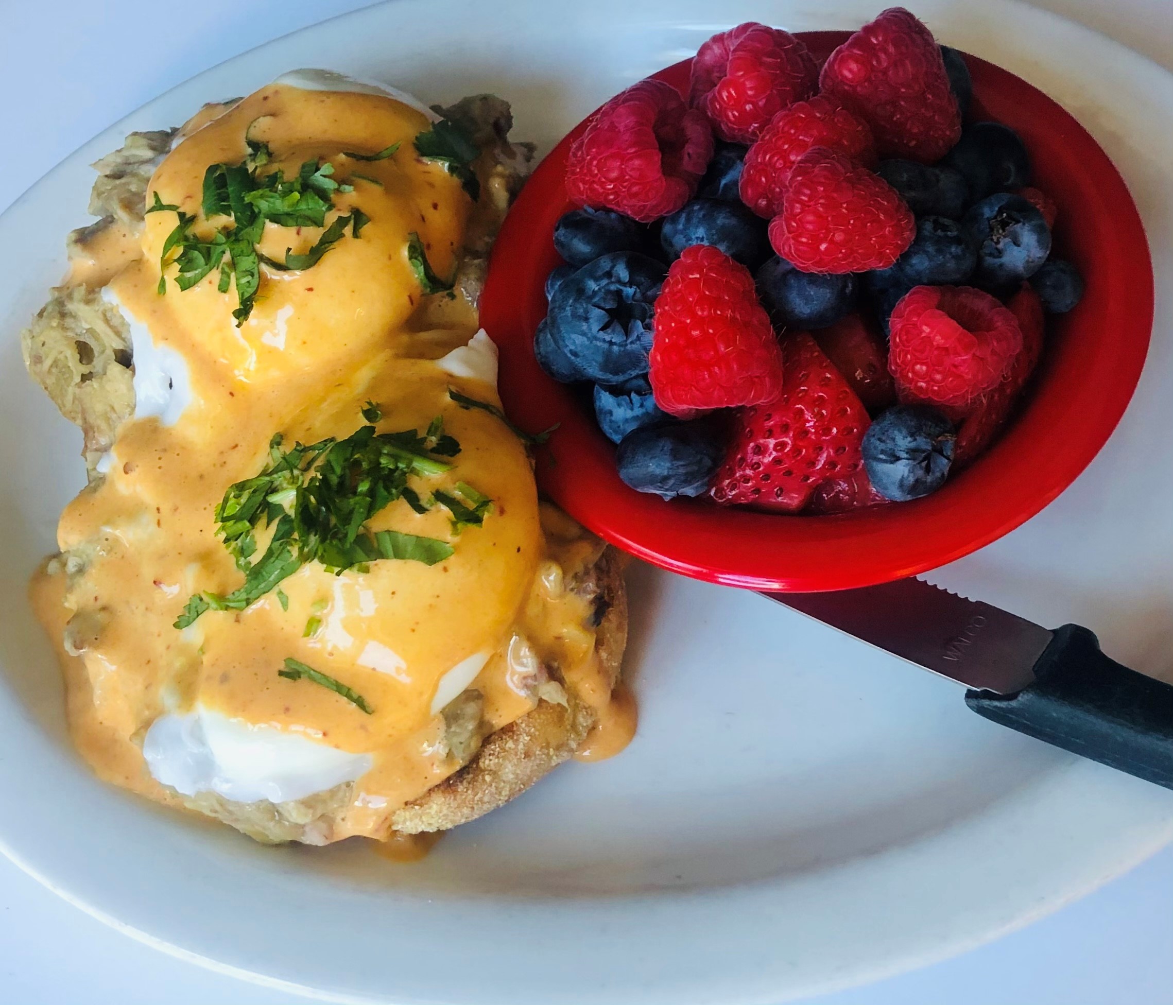 Eggs Benedict and fruit cup at Egg Planatation