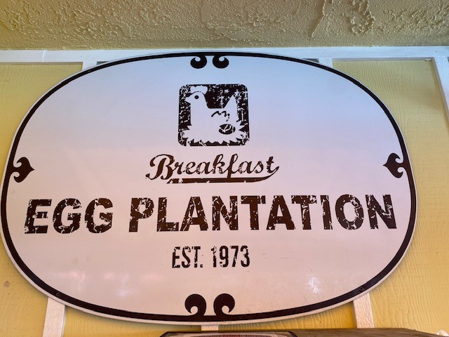 Sign that says: Breakfast Egg Plantation Est. 1973