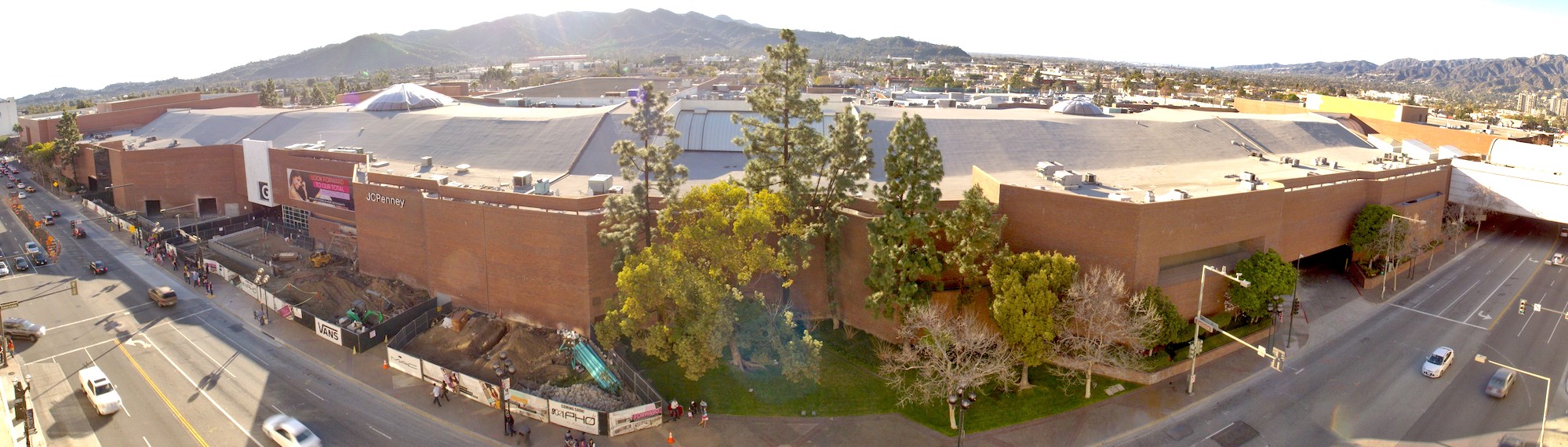 View of the Glendale Galleria building with hills in the background