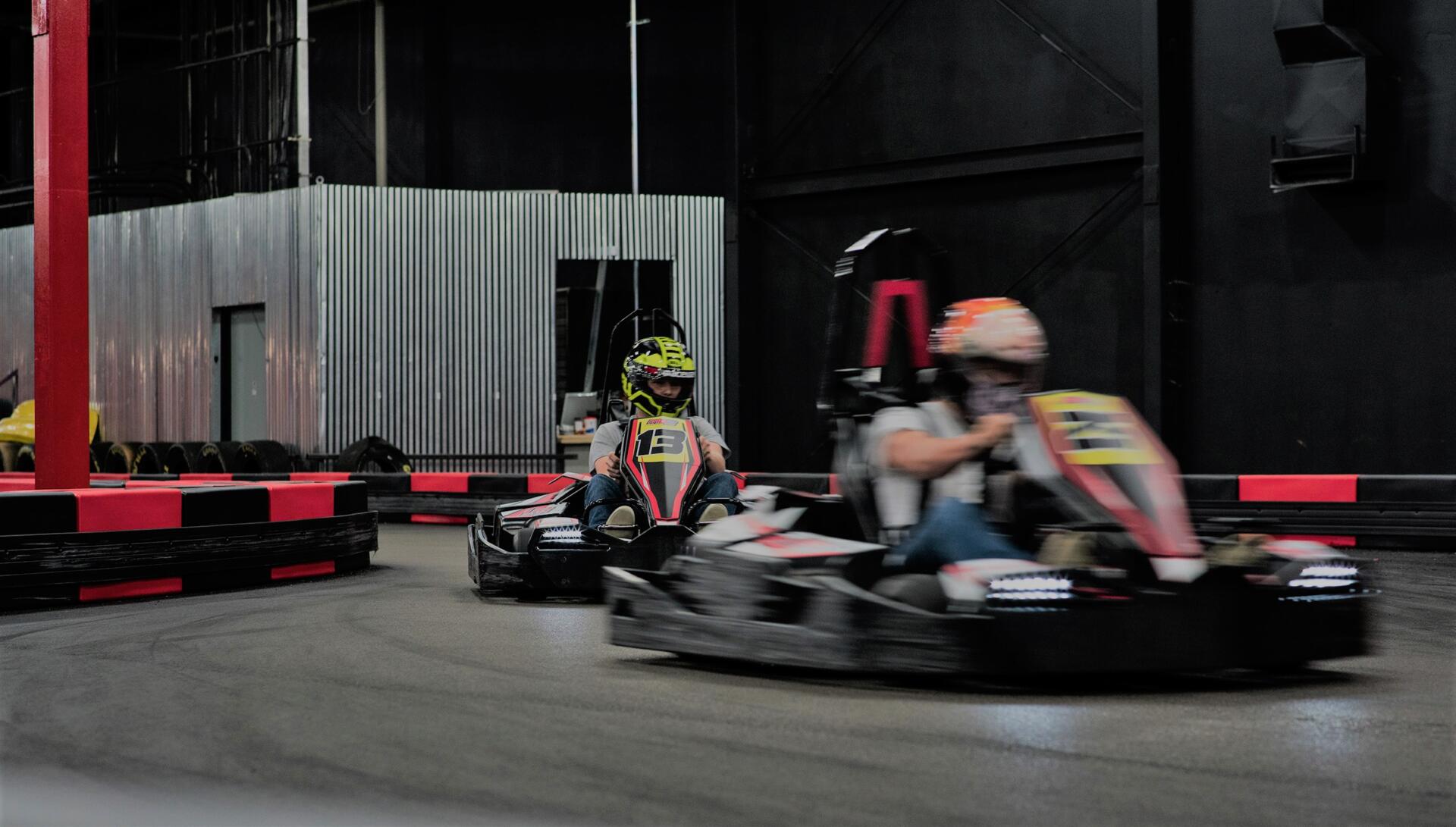 Go Kart Racers on the track at MB2 Raceway