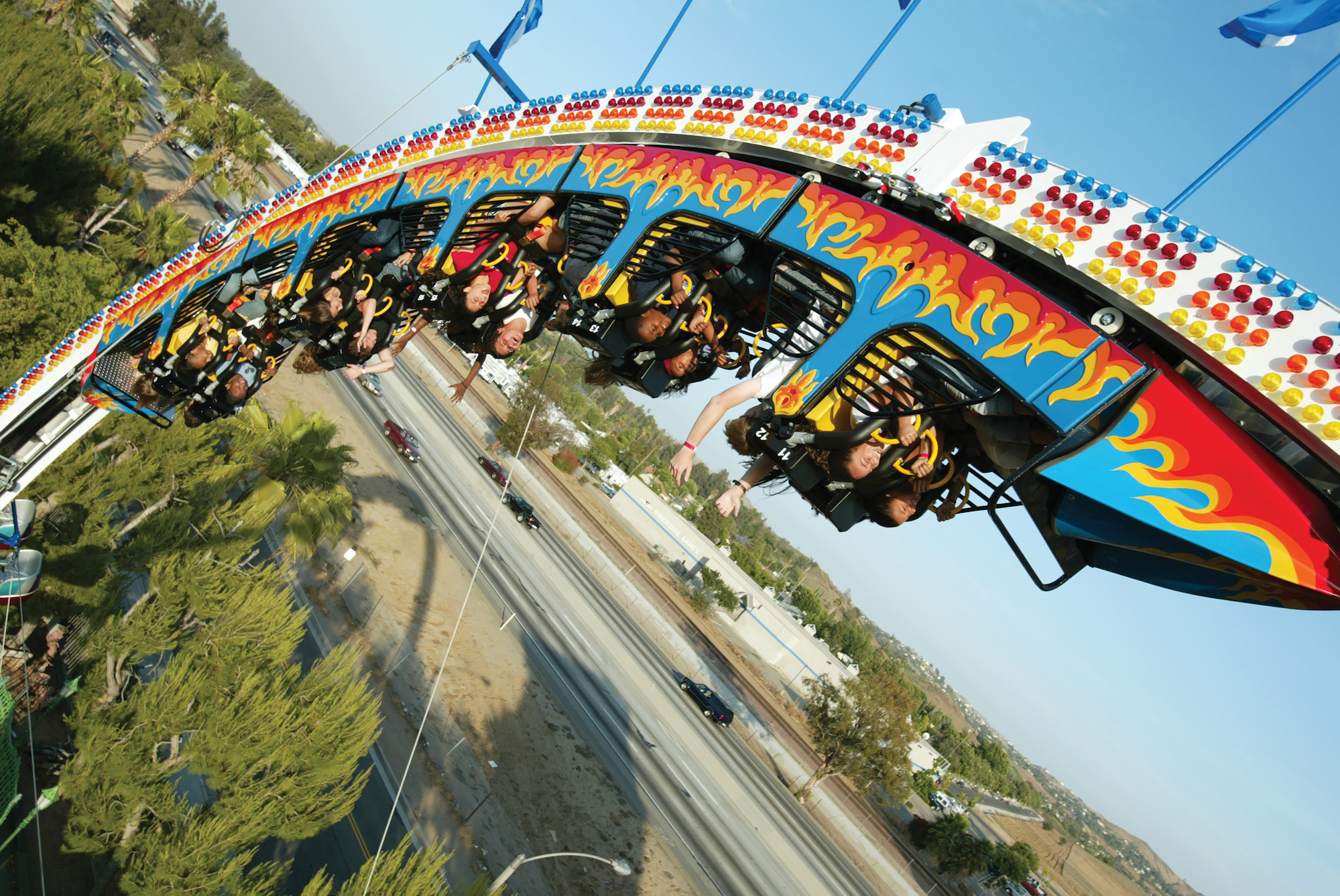 Visitors upside down on the FireBall roller coaster at Castle Park.