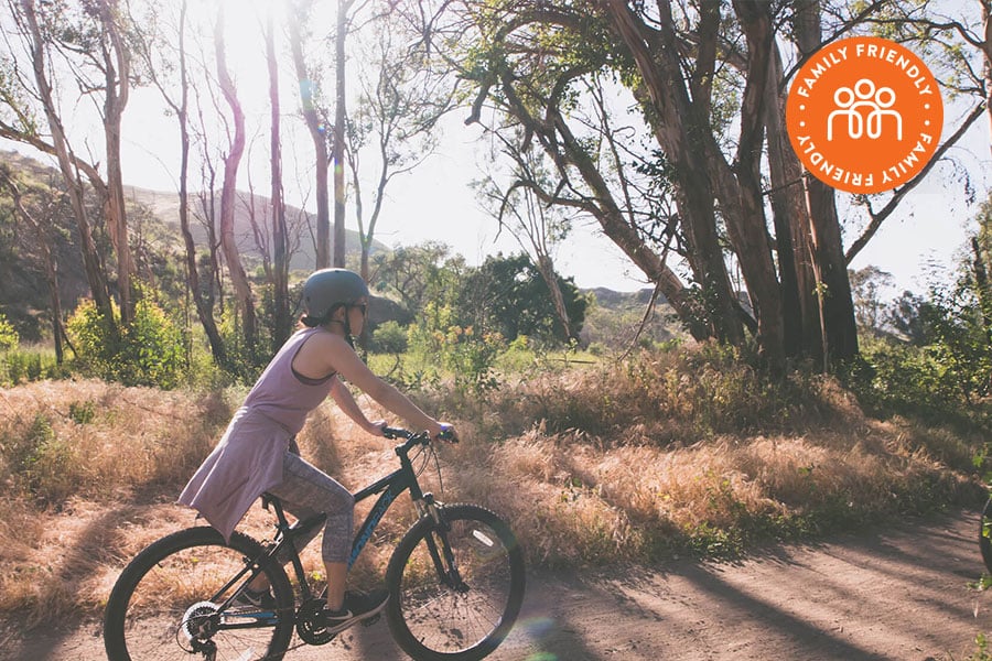 Bike rider riding a bicycle on Hill Canyon Trail.