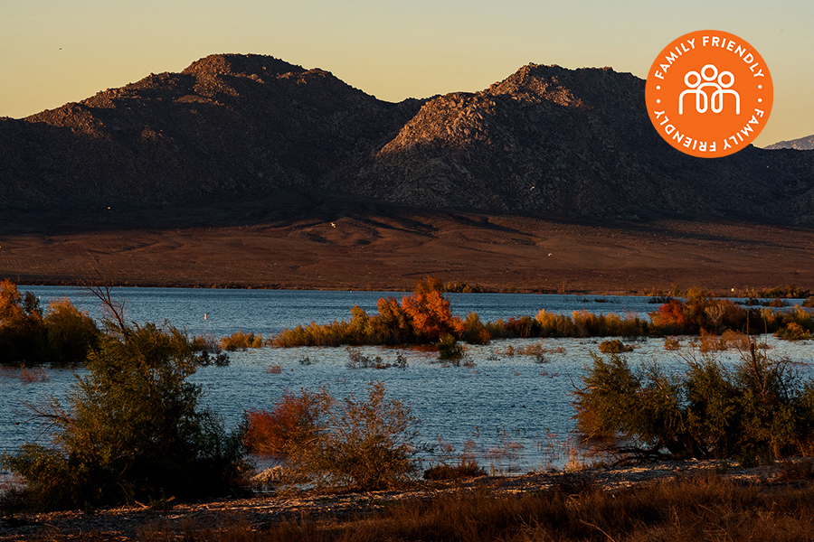 Lake Perris at dusk. Image stamped with a Family Friendly badge.
