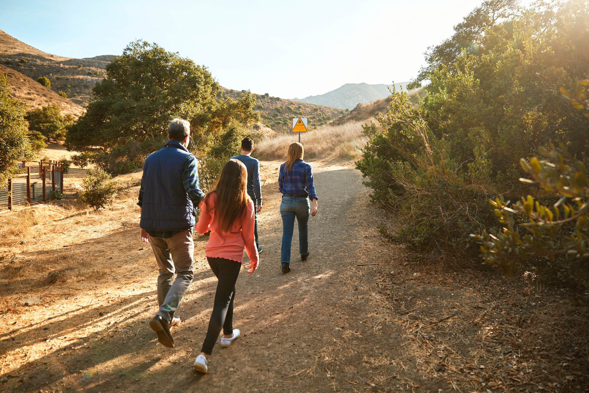 Four people hiking in Camarillo Grove Park.